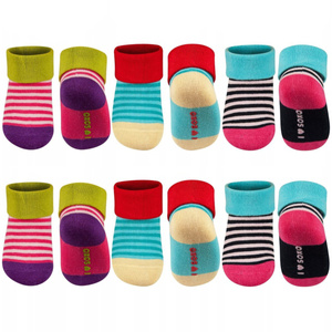A set of 3x SOXO baby socks with a wristband