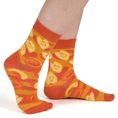 Women's orange SOXO GOOD STUFF socks with apricot jam in a jar