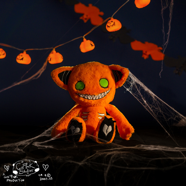 Gus Fink orange cat mascot Slurg