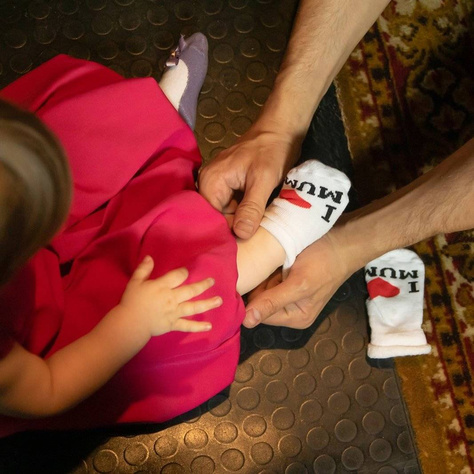 White SOXO baby socks with inscriptions