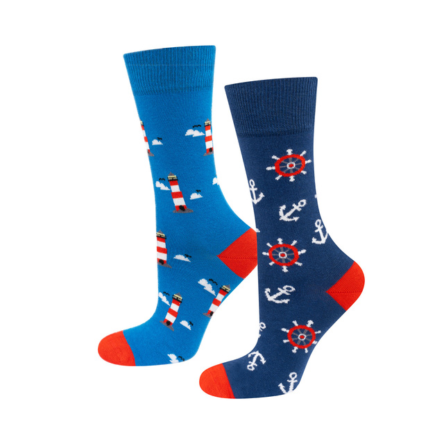 Colorful mismatched SOXO GOOD STUFF socks lighthouse